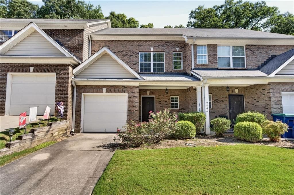 3 bedroom, 3 bathroom, 1,430 sq ft townhouse for sale at 2555 Flat Shoals Road 2503, Atlanta, GA 30349 — photo 1 of 32