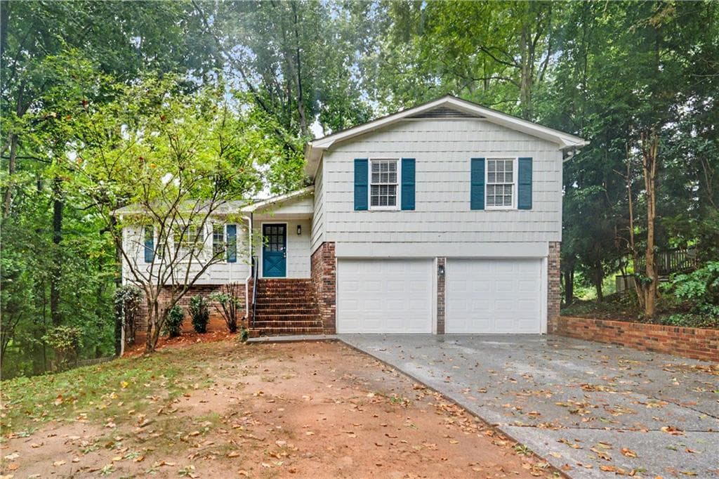 4 bedroom, 3 bathroom, 2,231 sq ft single family residence for sale at 4732 Hickory Court, Lilburn, GA 30047
