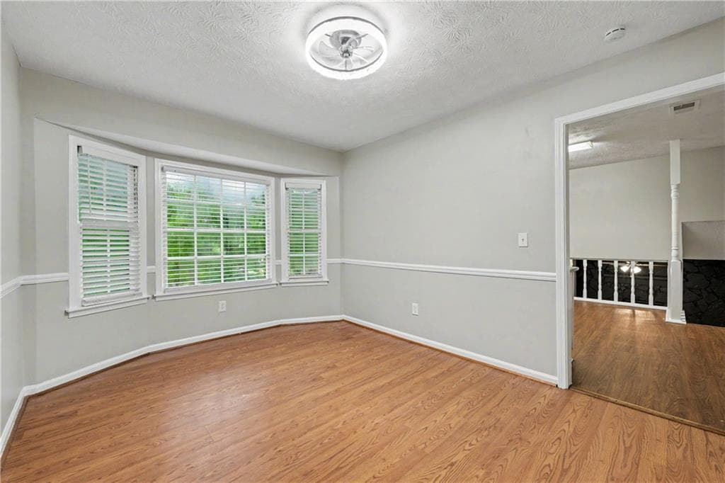 4 bedroom, 3 bathroom, 2,231 sq ft single family residence for sale at 4732 Hickory Court, Lilburn, GA 30047 — photo 4