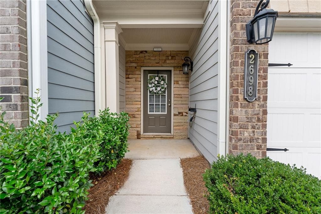4 bedroom, 3 bathroom, 1,964 sq ft townhouse for sale at 2698 Village Park Bend, Duluth, GA 30096 — photo 2