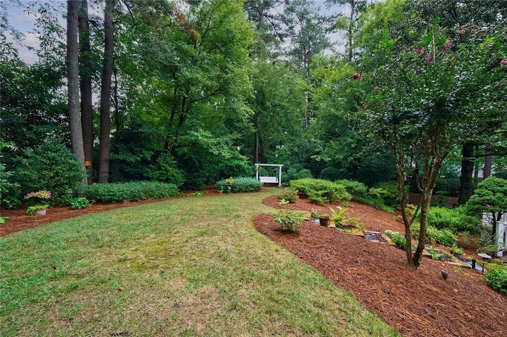 4 bedroom, 3 bathroom, 2,573 sq ft single family residence for sale at 3952 Club Drive, Atlanta, GA 30319 — photo 4