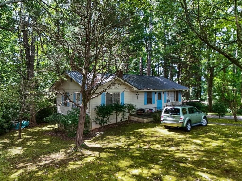 3 bedroom, 1 bathroom, 1,056 sq ft single family residence for sale at 15225 Thompson Road, Milton, GA 30004 — photo 3