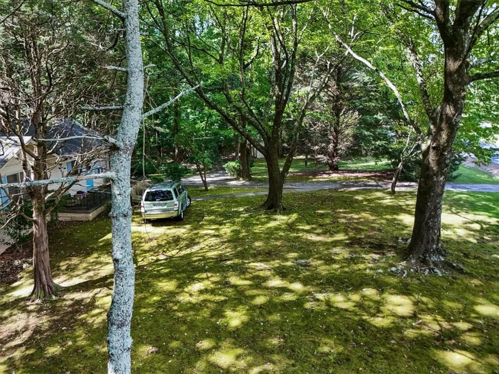 3 bedroom, 1 bathroom, 1,056 sq ft single family residence for sale at 15225 Thompson Road, Milton, GA 30004 — photo 5