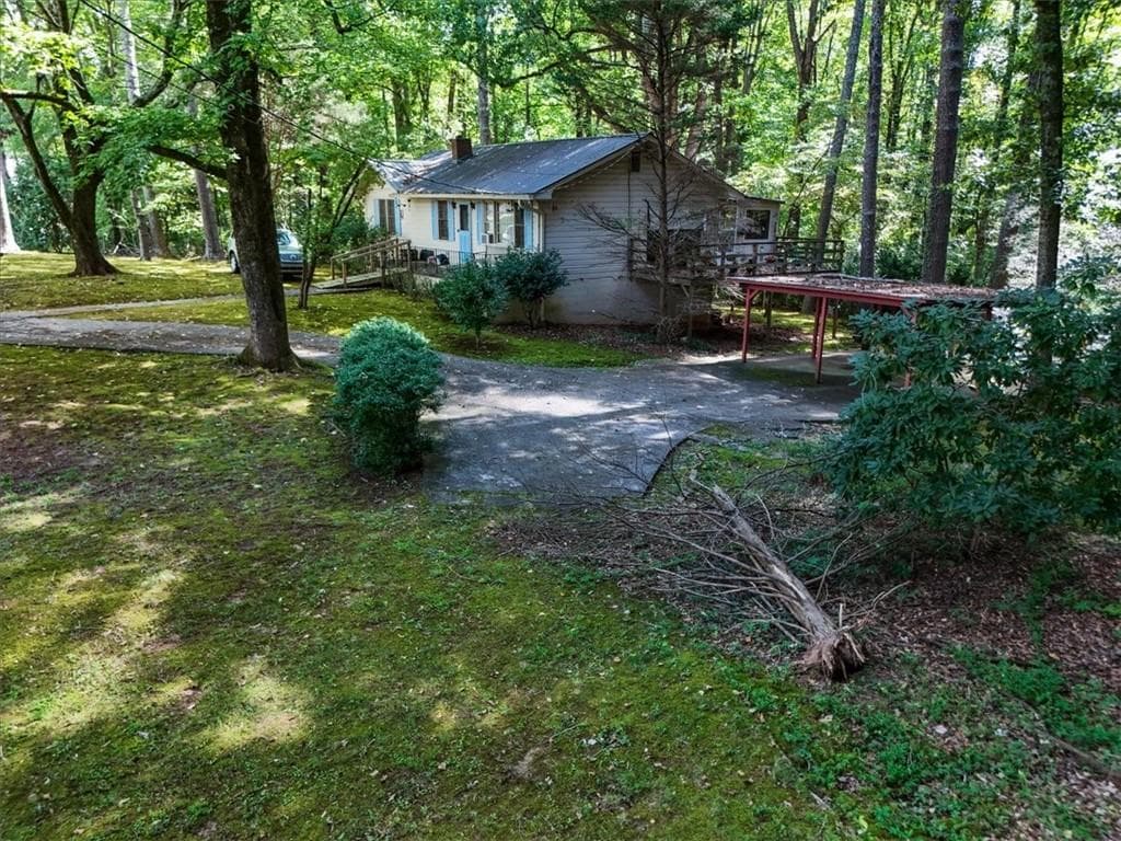 3 bedroom, 1 bathroom, 1,056 sq ft single family residence for sale at 15225 Thompson Road, Milton, GA 30004 — photo 6