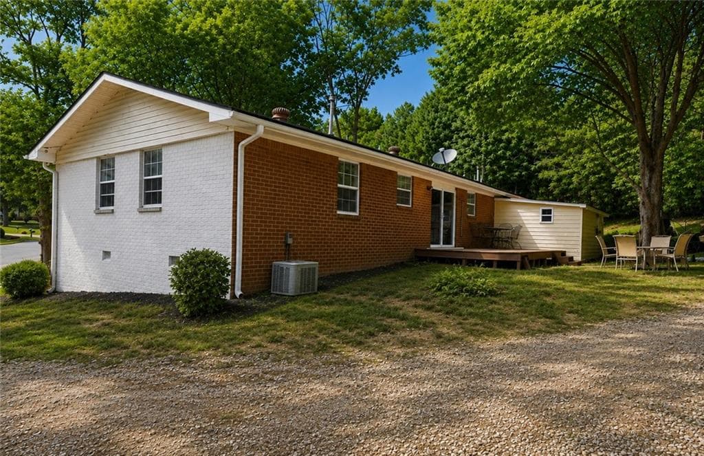 4 bedroom, 2 bathroom, 1,276 sq ft single family residence for sale at 4435 Winding Creek Drive, Cumming, GA 30028 — photo 5