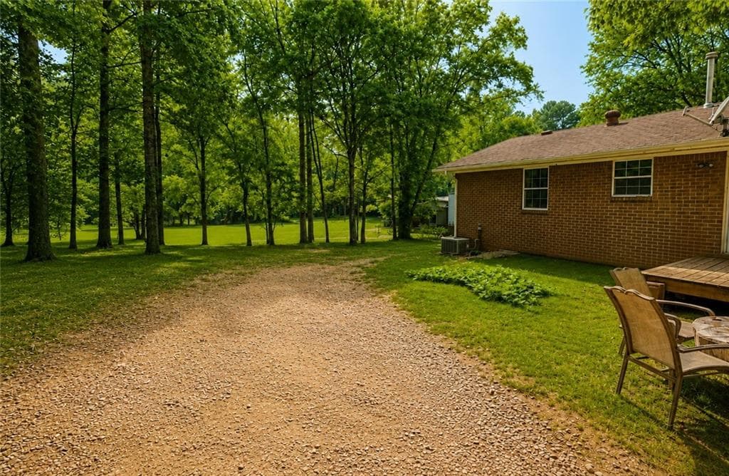 4 bedroom, 2 bathroom, 1,276 sq ft single family residence for sale at 4435 Winding Creek Drive, Cumming, GA 30028 — photo 8