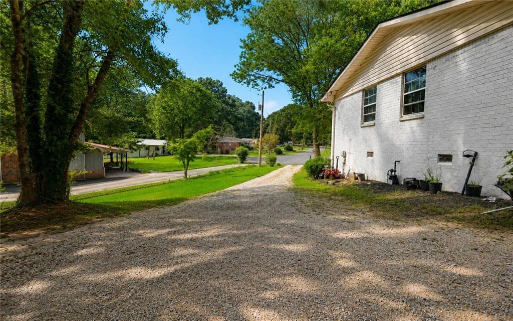4 bedroom, 2 bathroom, 1,276 sq ft single family residence for sale at 4435 Winding Creek Drive, Cumming, GA 30028 — photo 6