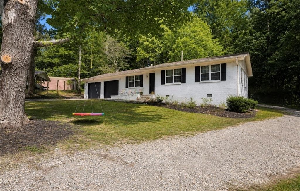 4 bedroom, 2 bathroom, 1,276 sq ft single family residence for sale at 4435 Winding Creek Drive, Cumming, GA 30028 — photo 3