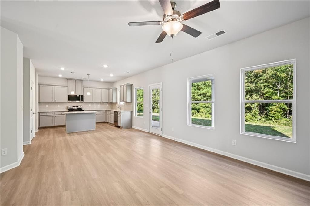 4 bedroom, 3 bathroom, 2,030 sq ft single family residence for sale at 11147 Suria Drive, Covington, GA 30014 — photo 5