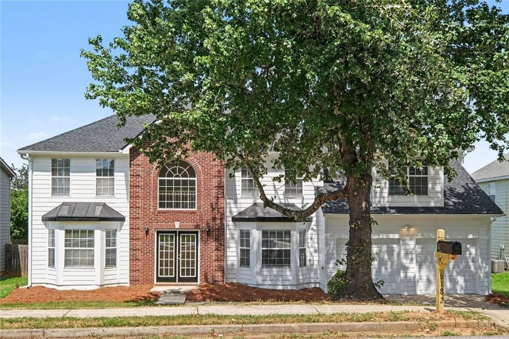 5 bedroom, 3 bathroom, 2,889 sq ft single family residence for sale at 6182 Giles Road, Lithonia, GA 30058 — photo 1 of 35