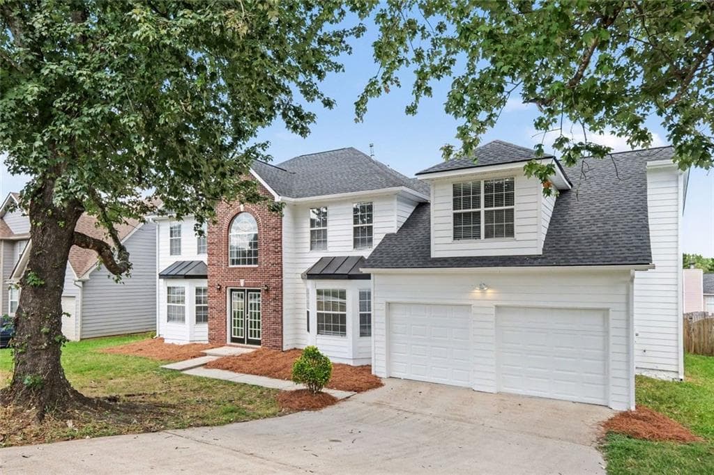 5 bedroom, 3 bathroom, 2,889 sq ft single family residence for sale at 6182 Giles Road, Lithonia, GA 30058 — photo 2