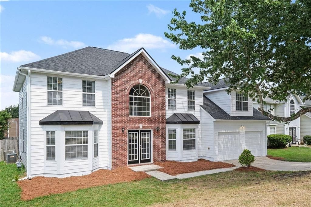 5 bedroom, 3 bathroom, 2,889 sq ft single family residence for sale at 6182 Giles Road, Lithonia, GA 30058 — photo 3