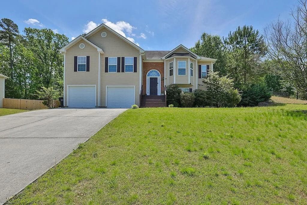 5 bedroom, 3 bathroom, 2,690 sq ft single family residence for sale at 1322 Dodger Way, Lawrenceville, GA 30045 — photo 1 of 31