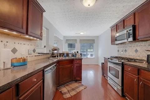 5 bedroom, 3 bathroom, 2,690 sq ft single family residence for sale at 1322 Dodger Way, Lawrenceville, GA 30045 — photo 6