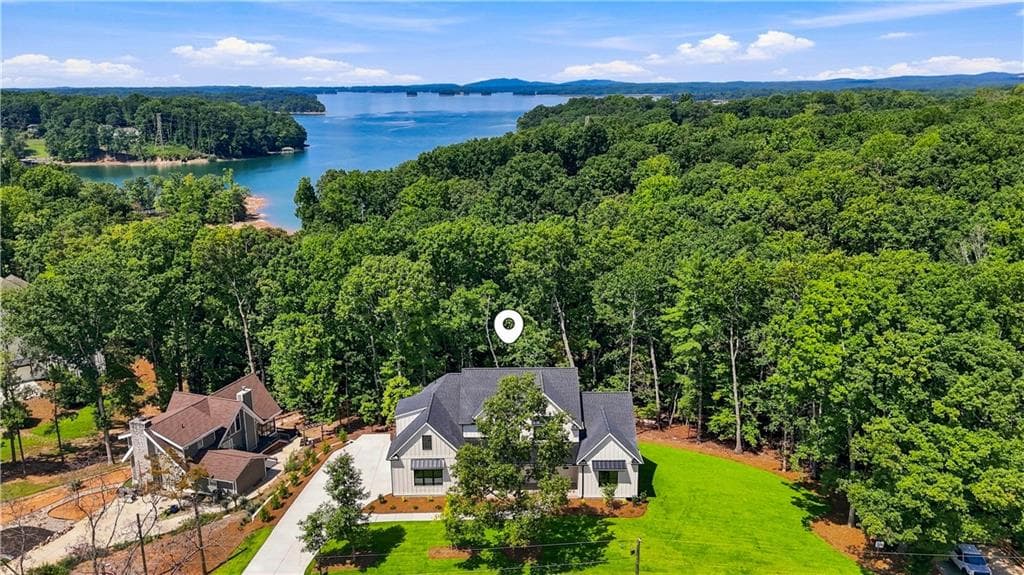 5 bedroom, 6 bathroom, 6,811 sq ft single family residence for sale at 5990 Warpath Road, Flowery Branch, GA 30542 — photo 3
