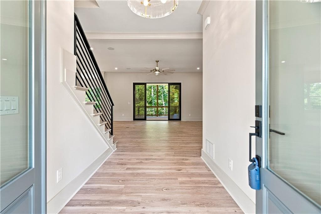 5 bedroom, 6 bathroom, 6,811 sq ft single family residence for sale at 5990 Warpath Road, Flowery Branch, GA 30542 — photo 8