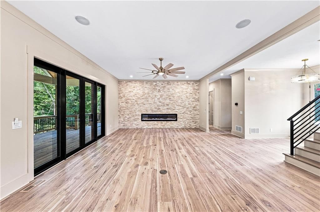 5 bedroom, 6 bathroom, 6,811 sq ft single family residence for sale at 5990 Warpath Road, Flowery Branch, GA 30542 — photo 9
