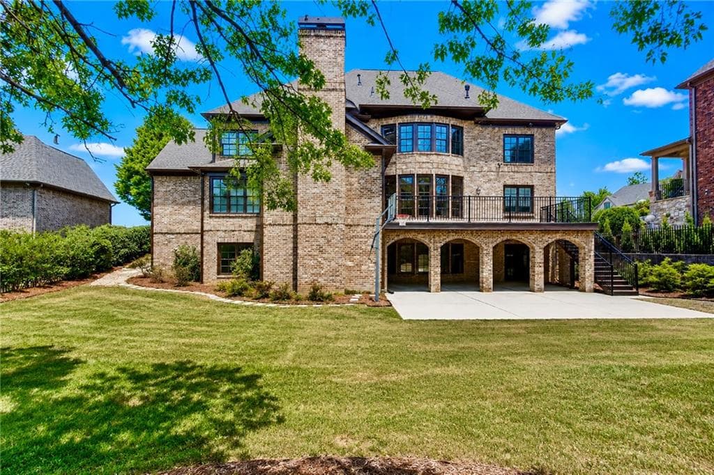 6 bedroom, 7 bathroom, 8,164 sq ft single family residence for sale at 1820 Turnberry Avenue, Suwanee, GA 30024 — photo 2