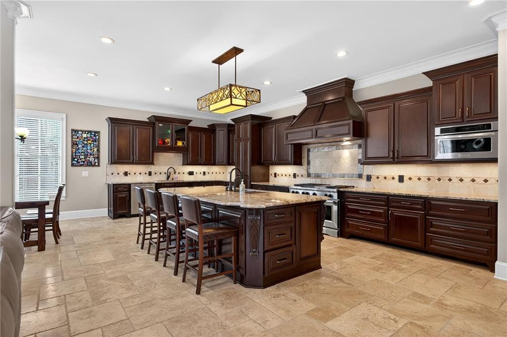 6 bedroom, 7 bathroom, 8,164 sq ft single family residence for sale at 1820 Turnberry Avenue, Suwanee, GA 30024 — photo 3