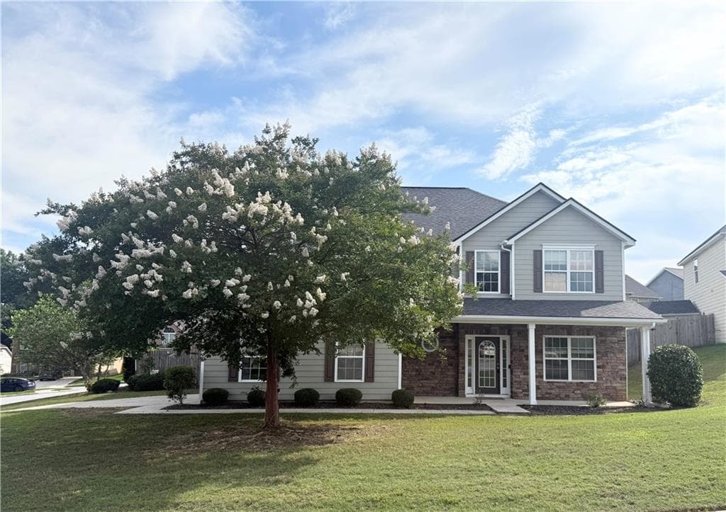 4 bedroom, 3 bathroom, 3,026 sq ft single family residence for sale at 1115 Grey Rock Way, Suwanee, GA 30024 — photo 2