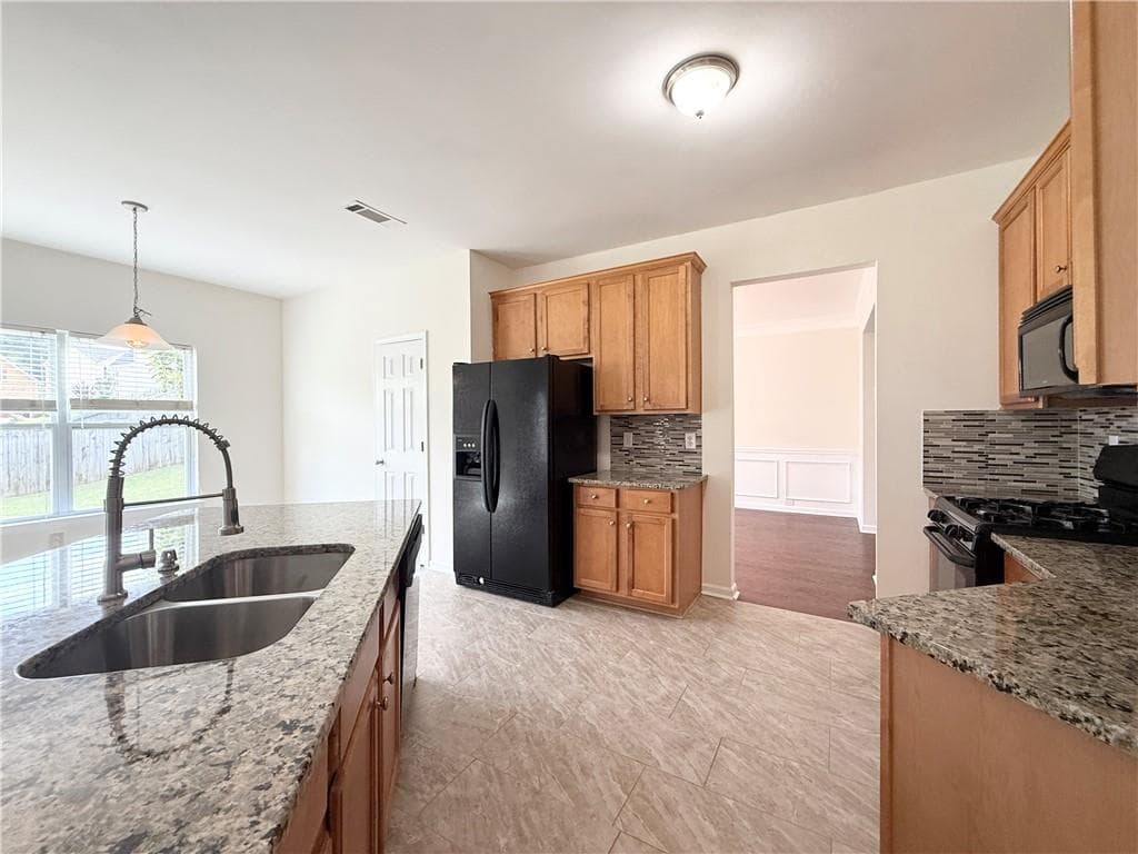 4 bedroom, 3 bathroom, 3,026 sq ft single family residence for sale at 1115 Grey Rock Way, Suwanee, GA 30024 — photo 8