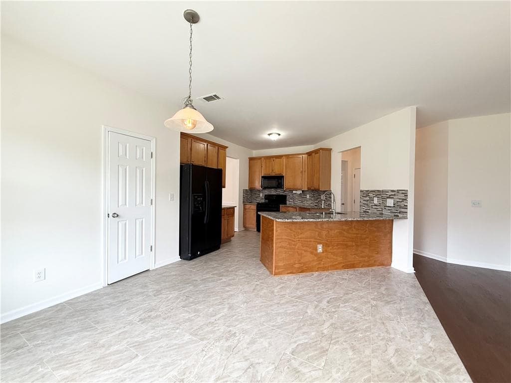 4 bedroom, 3 bathroom, 3,026 sq ft single family residence for sale at 1115 Grey Rock Way, Suwanee, GA 30024 — photo 9