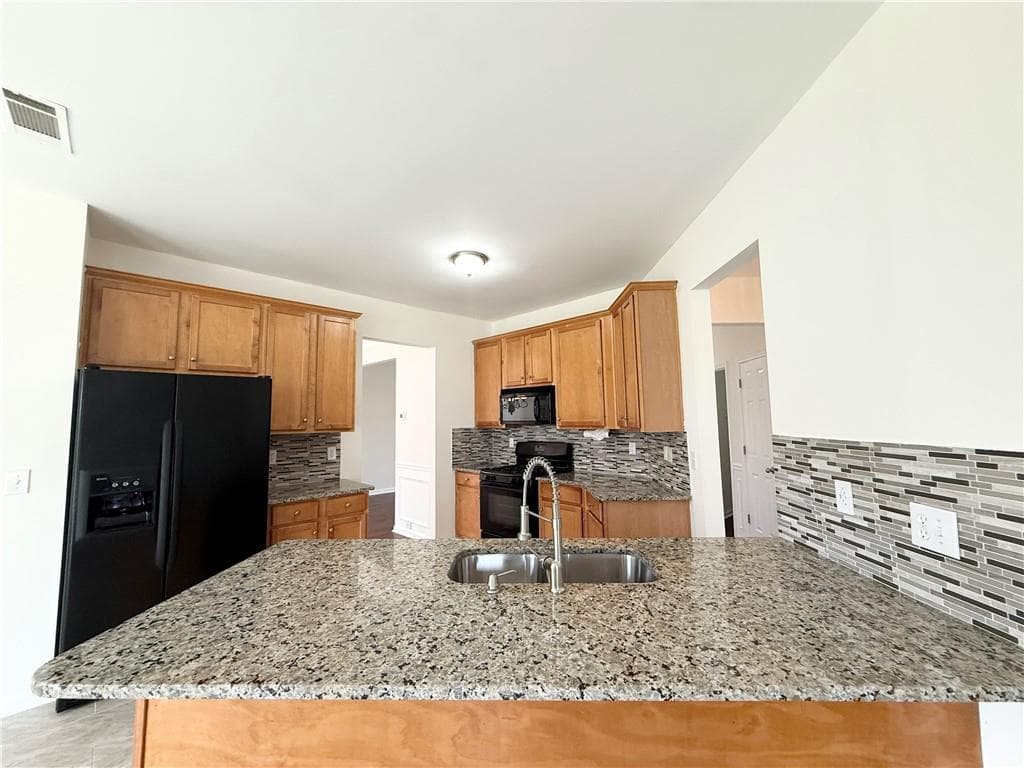 4 bedroom, 3 bathroom, 3,026 sq ft single family residence for sale at 1115 Grey Rock Way, Suwanee, GA 30024 — photo 10