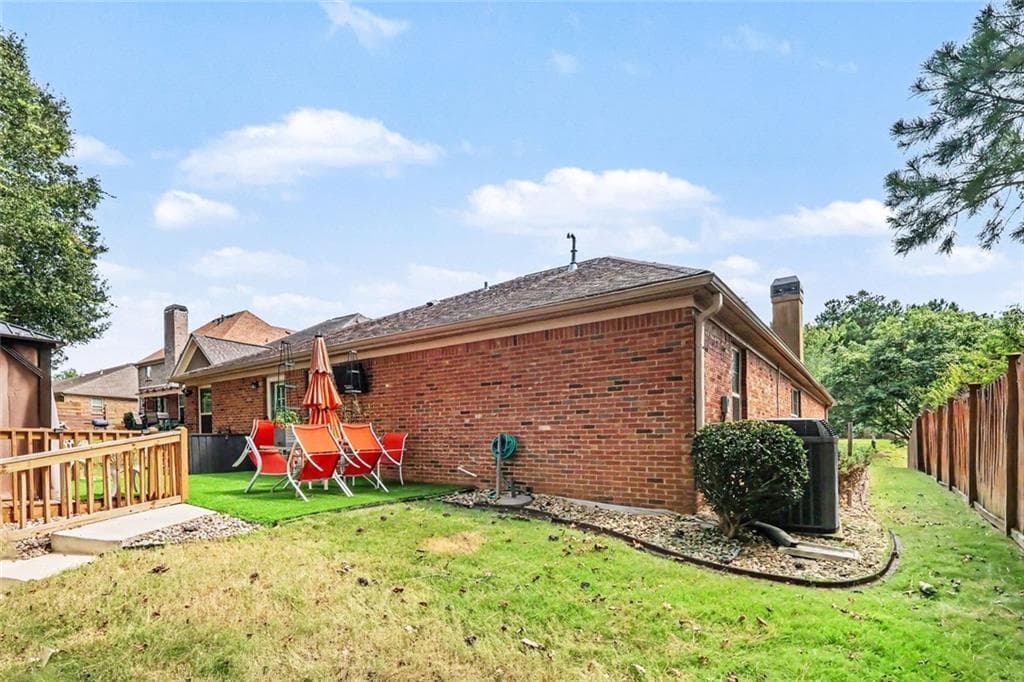 4 bedroom, 3 bathroom, 2,174 sq ft single family residence for sale at 8001 Gossamer Drive, Fairburn, GA 30213 — photo 3