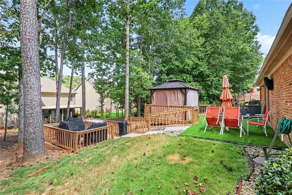 4 bedroom, 3 bathroom, 2,174 sq ft single family residence for sale at 8001 Gossamer Drive, Fairburn, GA 30213 — photo 4