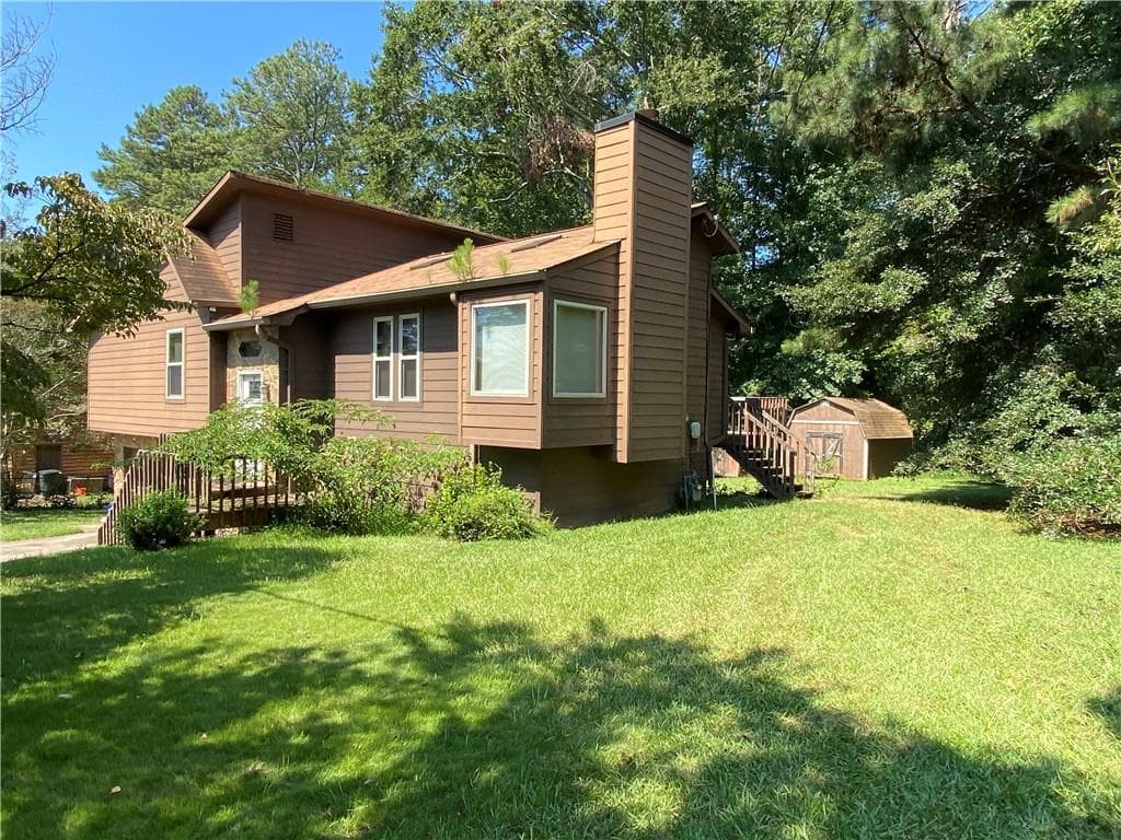3 bedroom, 2 bathroom, 1,693 sq ft single family residence under contract at 4911 Cowan Road, Acworth, GA 30101 — photo 2