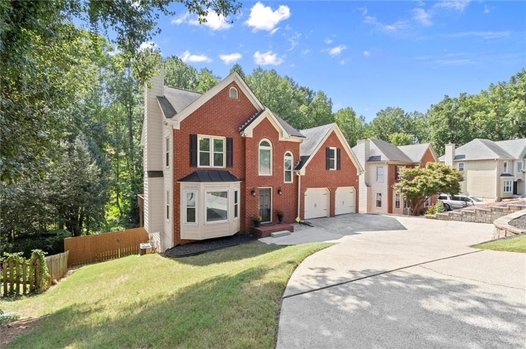 4 bedroom, 3 bathroom, 1,956 sq ft single family residence for sale at 4895 Farm Valley Drive, Woodstock, GA 30188