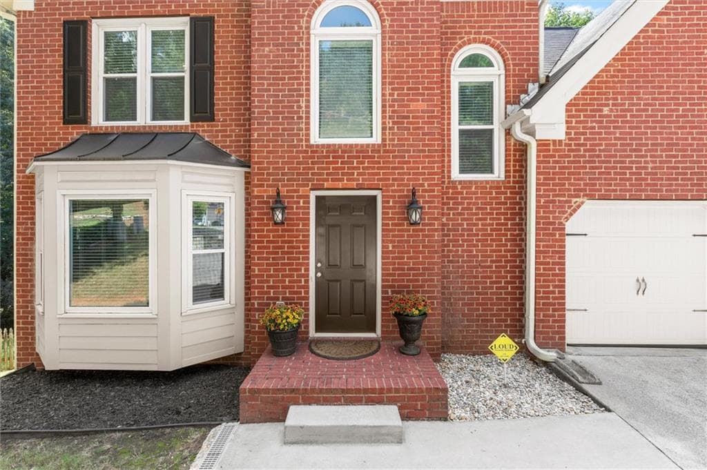 4 bedroom, 3 bathroom, 1,956 sq ft single family residence for sale at 4895 Farm Valley Drive, Woodstock, GA 30188 — photo 2