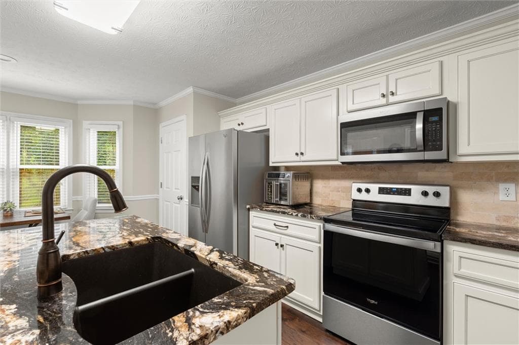 4 bedroom, 3 bathroom, 1,956 sq ft single family residence for sale at 4895 Farm Valley Drive, Woodstock, GA 30188 — photo 9