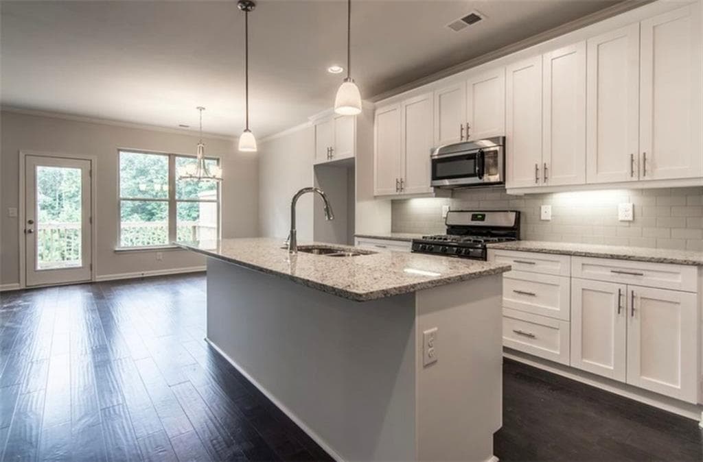 3 bedroom, 3 bathroom, 2,074 sq ft townhouse for rent at 5520 Bright Cross Way, Suwanee, GA 30024 for $2,600 a month — photo 2