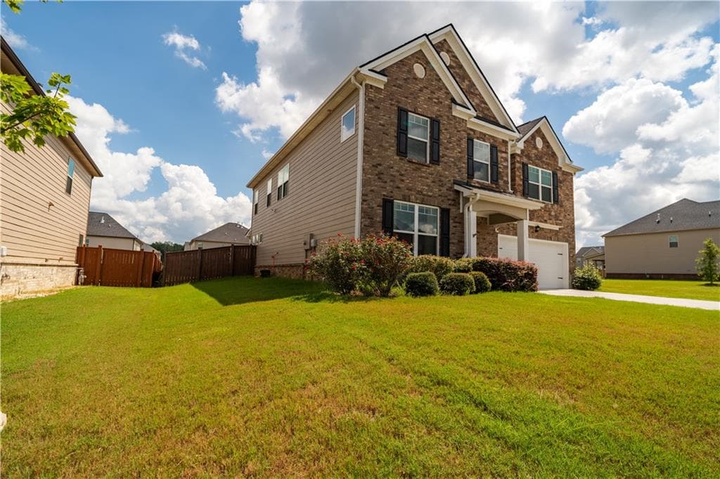 5 bedroom, 3 bathroom, 3,250 sq ft single family residence for sale at 3276 Papyrus Palm Road, Loganville, GA 30052 — photo 3