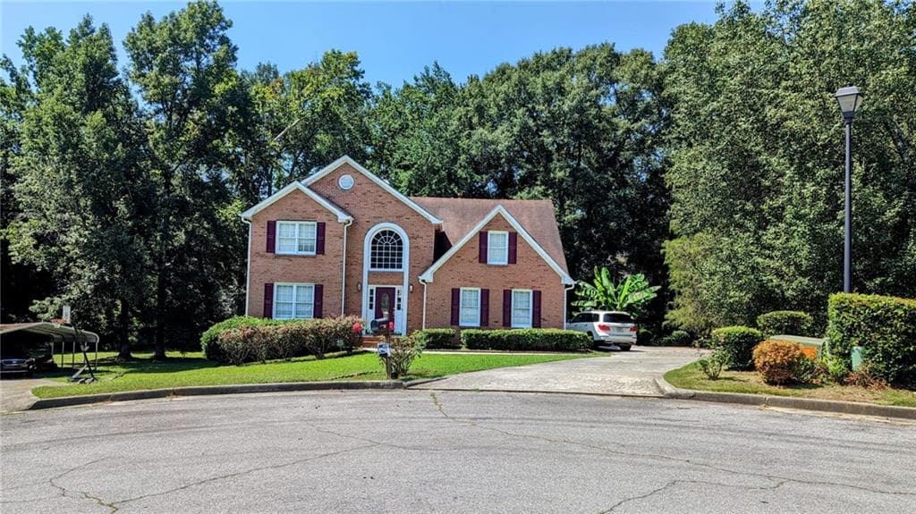 4 bedroom, 4 bathroom, 3,483 sq ft single family residence for sale at 1810 Rockside Lane, Snellville, GA 30078 — photo 2