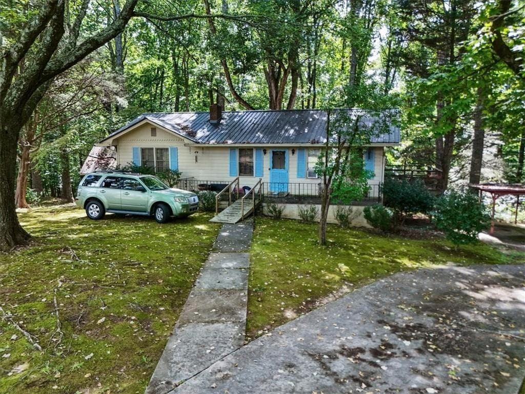 3 bedroom, 1 bathroom single family residence for sale at 15225 Thompson Road, Milton, GA 30004 — photo 4