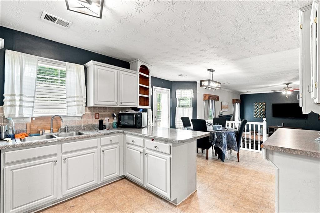 4 bedroom, 3 bathroom, 2,321 sq ft single family residence for sale at 210 Spring Lake Terrace, Covington, GA 30016 — photo 9