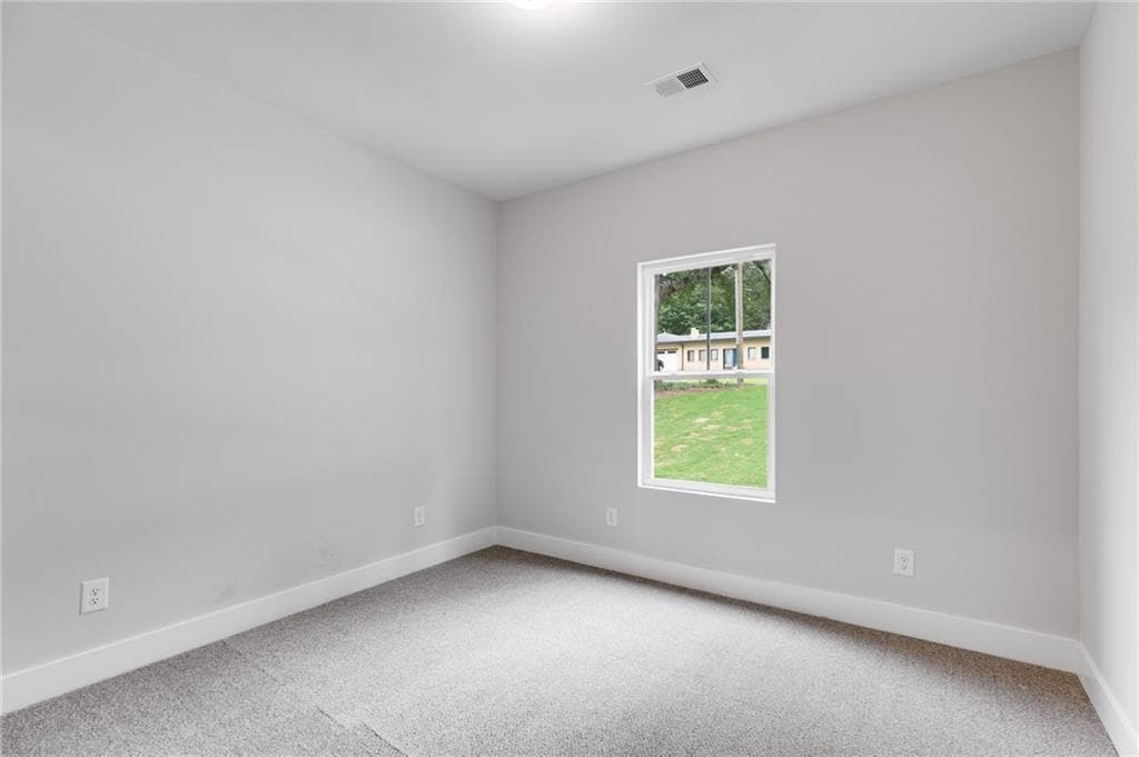 3 bedroom, 2 bathroom, 1,264 sq ft single family residence for sale at 310 Colonial Drive, Carrollton, GA 30117 — photo 4