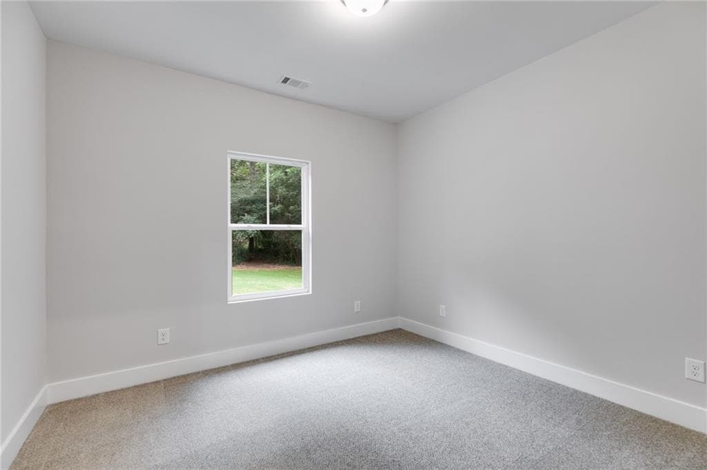 3 bedroom, 2 bathroom, 1,264 sq ft single family residence for sale at 310 Colonial Drive, Carrollton, GA 30117 — photo 5