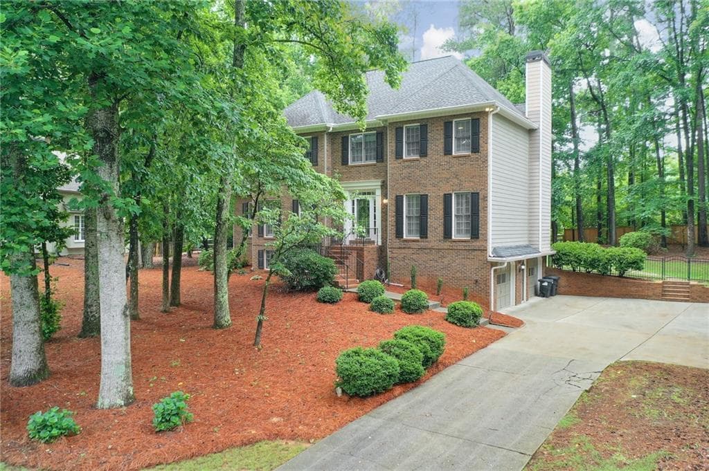 4 bedroom, 3 bathroom, 3,360 sq ft single family residence for sale at 353 Battle Woods Trail, Marietta, GA 30064