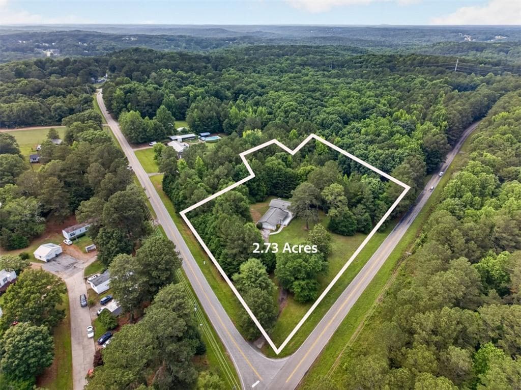 5 bedroom, 3 bathroom, 2,621 sq ft single family residence under contract at 1981 Lee Peters Road, Loganville, GA 30052 — photo 2