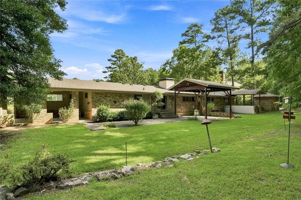 3 bedroom, 3 bathroom, 4,272 sq ft single family residence for sale at 245 Plantation Road, Fayetteville, GA 30214 — photo 2