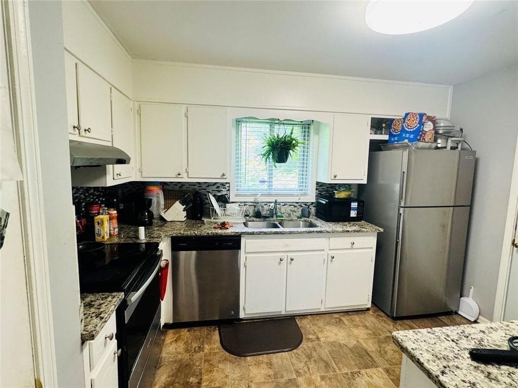 3 bedroom, 2 bathroom, 1,852 sq ft single family residence under contract at 521 Navarre Drive, Stone Mountain, GA 30087 — photo 7
