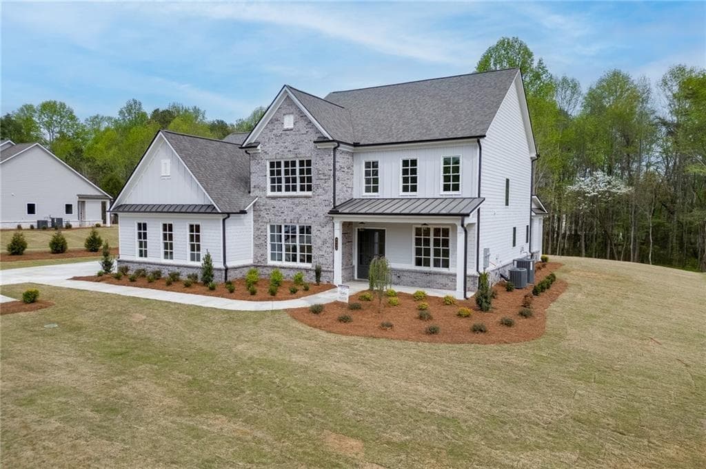 4 bedroom, 4 bathroom, 3,976 sq ft single family residence for sale at 5430 Settingdown Road, Cumming, GA 30041 — photo 3
