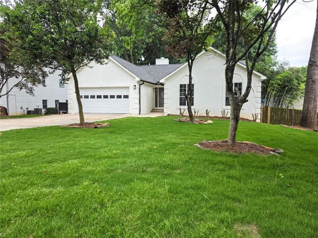 7 bedroom, 3 bathroom, 4,520 sq ft single family residence for sale at 2620 Logan Way, Lawrenceville, GA 30043 — photo 2