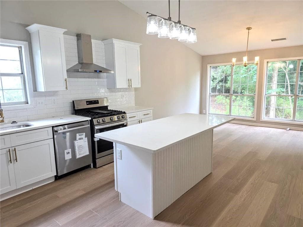 7 bedroom, 3 bathroom, 4,520 sq ft single family residence for sale at 2620 Logan Way, Lawrenceville, GA 30043 — photo 4