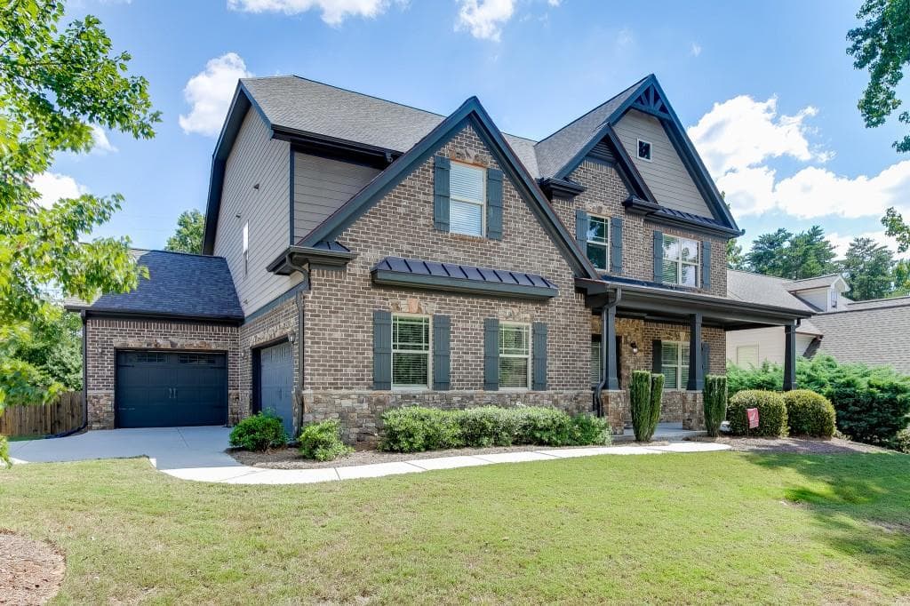 6 bedroom, 5 bathroom, 5,135 sq ft single family residence for sale at 2208 Mayors Way, Buford, GA 30519 — photo 2