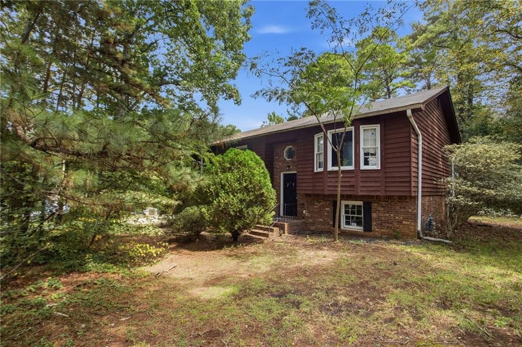 4 bedroom, 2 bathroom, 2,004 sq ft single family residence for sale at 255 Belmont Farms Drive, Ellenwood, GA 30294