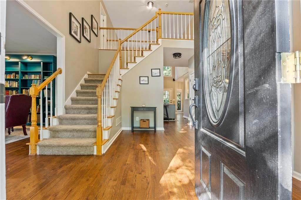 5 bedroom, 3 bathroom, 4,146 sq ft single family residence for sale at 2420 Bexford View, Cumming, GA 30041 — photo 2